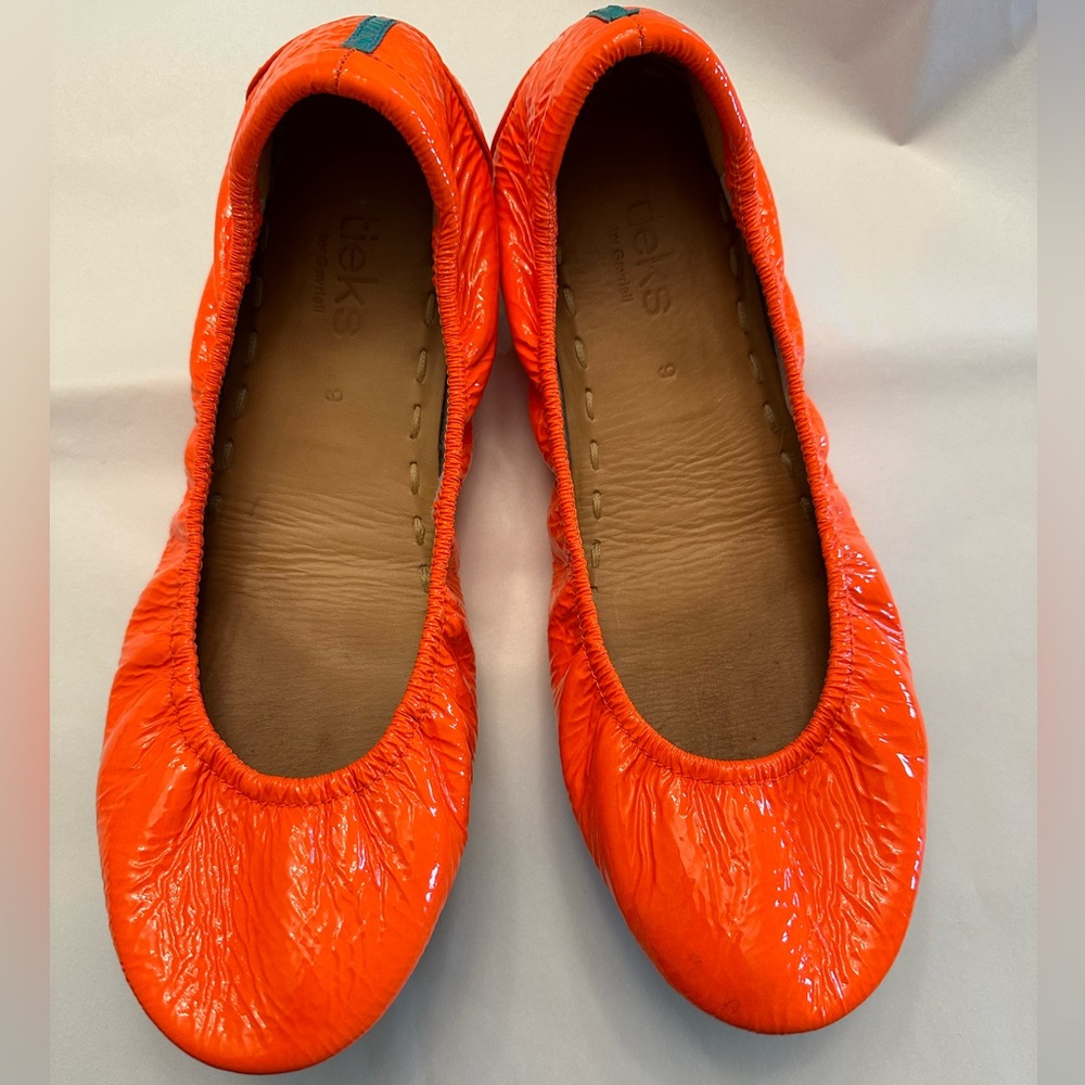 Outrageous Orange Tieks size 9